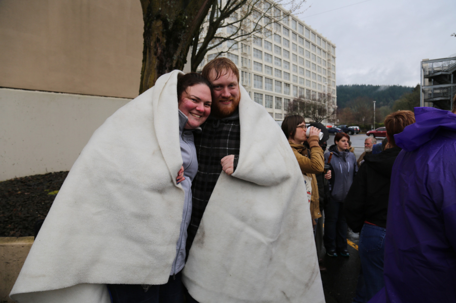 Kimberley Vanwig and Ben Brinkley brave the elements to attend a sale of props from the NBC show &quot;Grimm,&quot; which is in its final season.