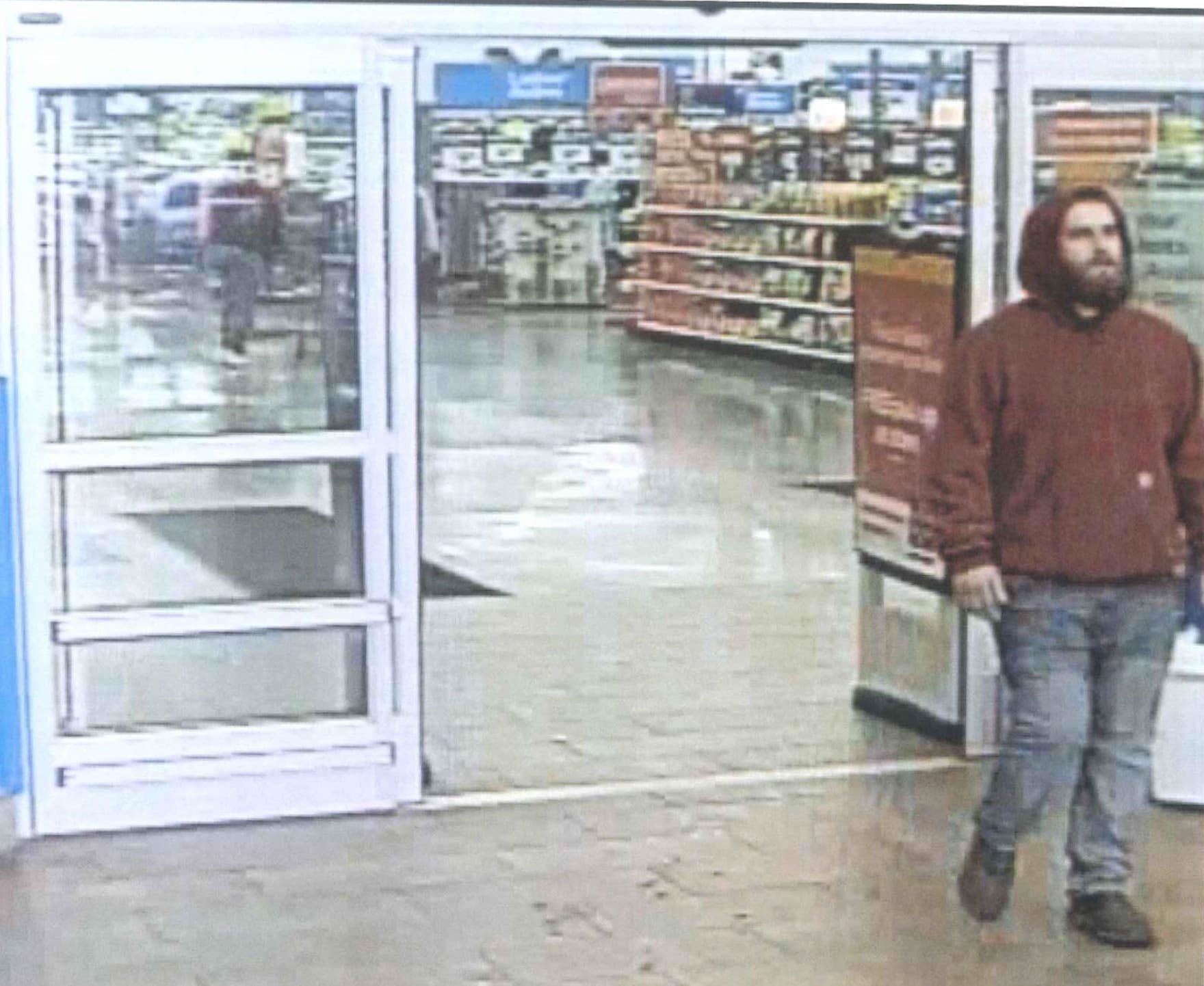 Battle Ground police are looking for this man, shown here in surveillance video taken from the Wal-Mart, in connection with a March 15 report of two females being touched inappropriately.