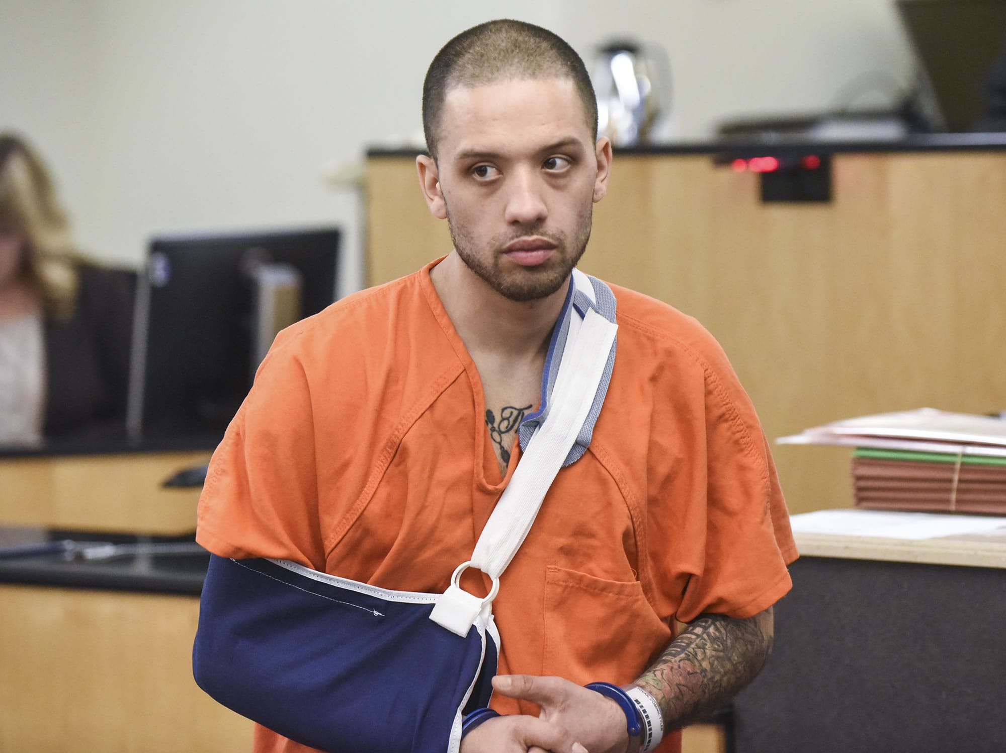 Dominic Tovar, the suspect in Saturday's officer-involved shooting, appears in Clark County Superior Court on Wednesday morning, March 1, 2017.