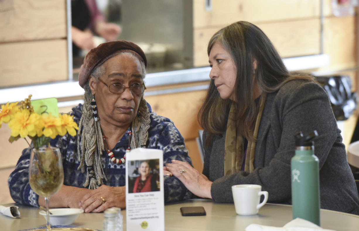 Becky Archibald, right, supports Lydia Newcomb on Monday during a meeting at the Firstenburg Community Center discussing a recent decision by Meals on Wheels People to close the center&#039;s dining room, which now serves about 14 seniors a day and delivers about 140 meals a day to housebound seniors.