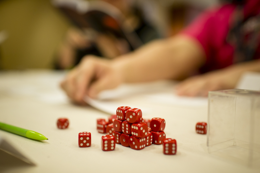 A large number of six-sided dice are used during at GameStorm.