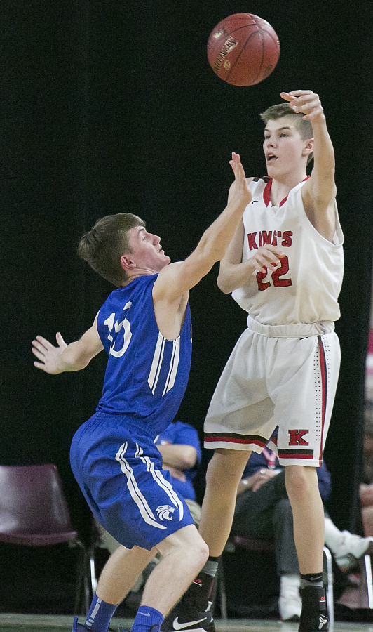 La Center guard, Jackson Leslie (15), defends King's Knights' Nate Kleppe (22), during the second round of the WIAA 1A boys state tournament on Thursday, Mar. 2, 2017, at the Yakima Valley SunDome. King's Knights defeated La Center Wildcats 51-48.