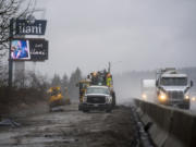 Construction crews prepare to pave the Interstate 5 southbound on-ramp near La Center.