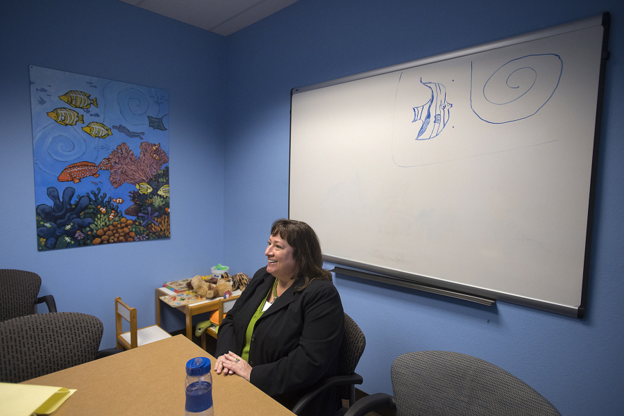 Against a backdrop of whimsical murals and toys, Amy Russell, the new director of the Children&#039;s Justice Center, describes what lead her to her new position.