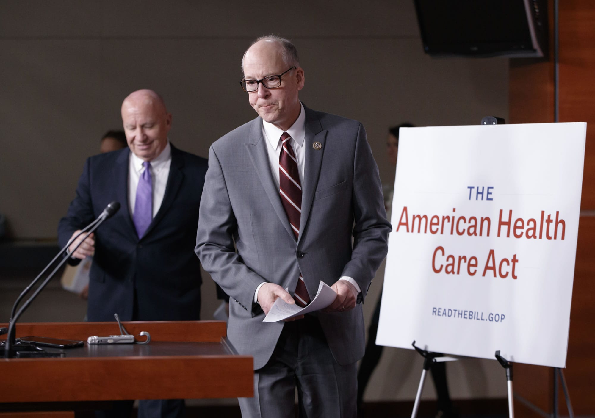 House Ways and Means Committee Chairman Rep, Kevin Brady, R-Texas, left, follows House Energy and Commerce Committee Chairman Rep. Greg Walden, R-Ore. to a news conference on Capitol Hill in Washington, Tuesday, March 7, 2017,  as House Republicans introduce their plan to repeal and replace the Affordable Care Act.  (AP Photo/J.