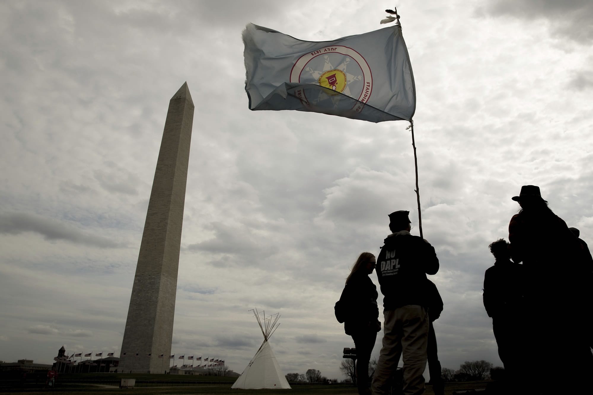 A group protesting the Dakota Access oil pipeline has set up teepees on the National Mall near the Washington Monument in Washington, Tuesday, March 7, 2017. A federal judge declined to temporarily stop construction of the final section of the disputed Dakota Access oil pipeline, clearing the way for oil to flow as soon as next week.