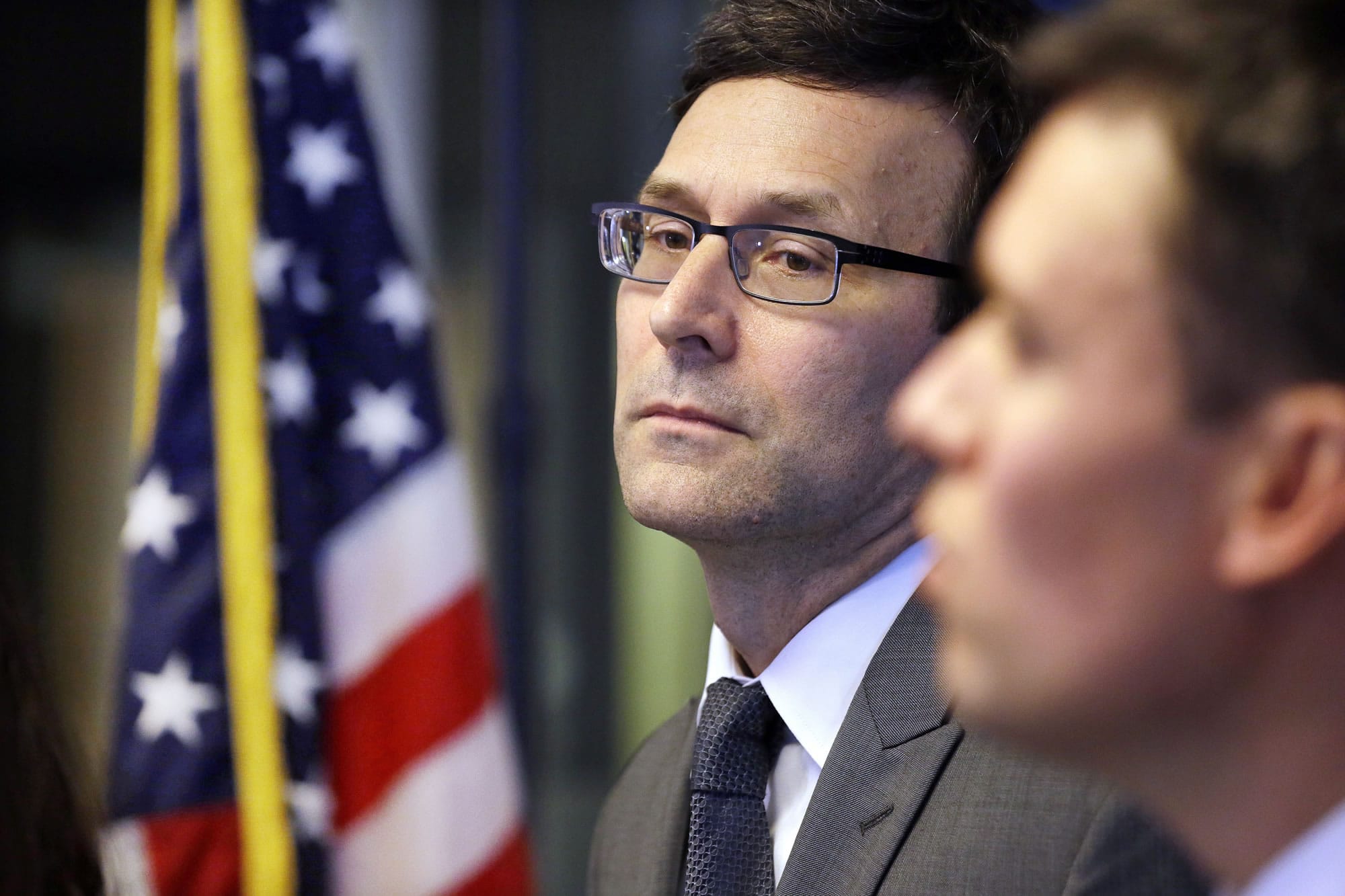 Washington State Attorney General Bob Ferguson listens to a question at a news conference the state's response to President Trump's revised travel ban Thursday, March 9, 2017, in Seattle. Legal challenges against Trump's revised travel ban mounted Thursday as Washington state said it would renew its request to block the executive order. It came a day after Hawaii launched its own lawsuit, and Ferguson said both Oregon and New York had asked to join his state's legal action.