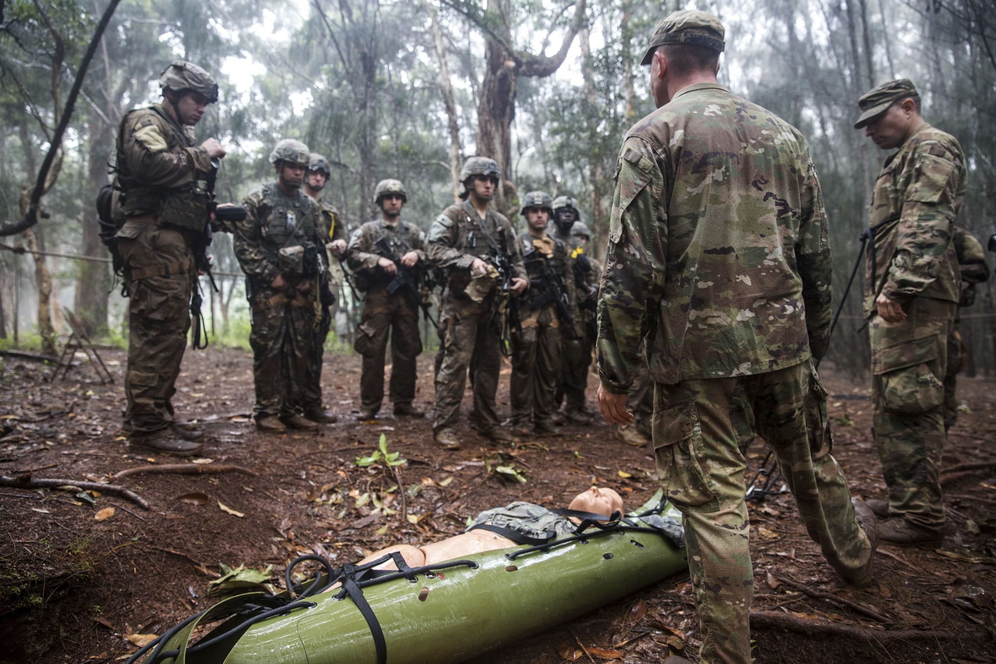 In this March 1, 2017, photo, soldiers from the U.S. Army's 25th Infantry Division 1st Stryker Brigade Combat Team participate in jungle warfare training at Schofield Barracks, Hawaii. The Army has set up a jungle training course amid a renewed focus on Asia and the Pacific after more than a decade of war in Iraq and Afghanistan.