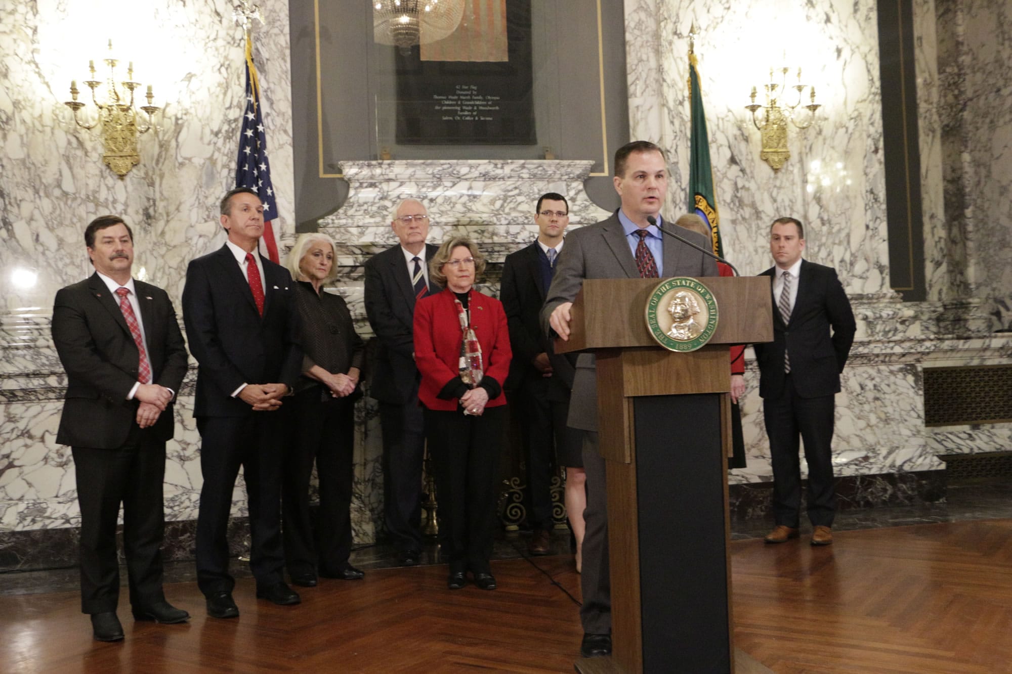 Sen. John Braun, joined by fellow Republican senators, speaks at a news conference about a two-year $43 billion budget proposal, Tuesday, March 21, 2017 in Olympia, Wash. The budget puts an additional $1.8 billion toward education.