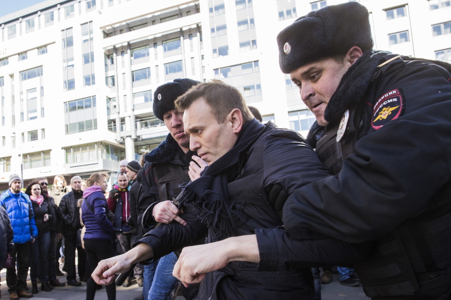 Alexei Navalny is detained Sunday by police in downtown Moscow, Russia. Russia&#039;s leading opposition figure, Navalny was sentenced Monday to a 15-day jail term for organizing an unauthorized protest in the capital.