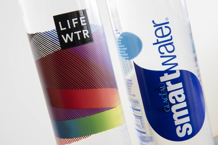 Bottles of Lifewtr and Smartwater are displayed. As bottled water surges in popularity, Coke, Pepsi and other companies are using celebrity endorsements, stylish packaging and fancy filtration processes like &quot;reverse osmosis&quot; to sell people on expanding variations of what comes out of the tap. They&#039;re also adding flourishes like bubbles, flavors or sweeteners that can blur the lines between what is water and what is soda.