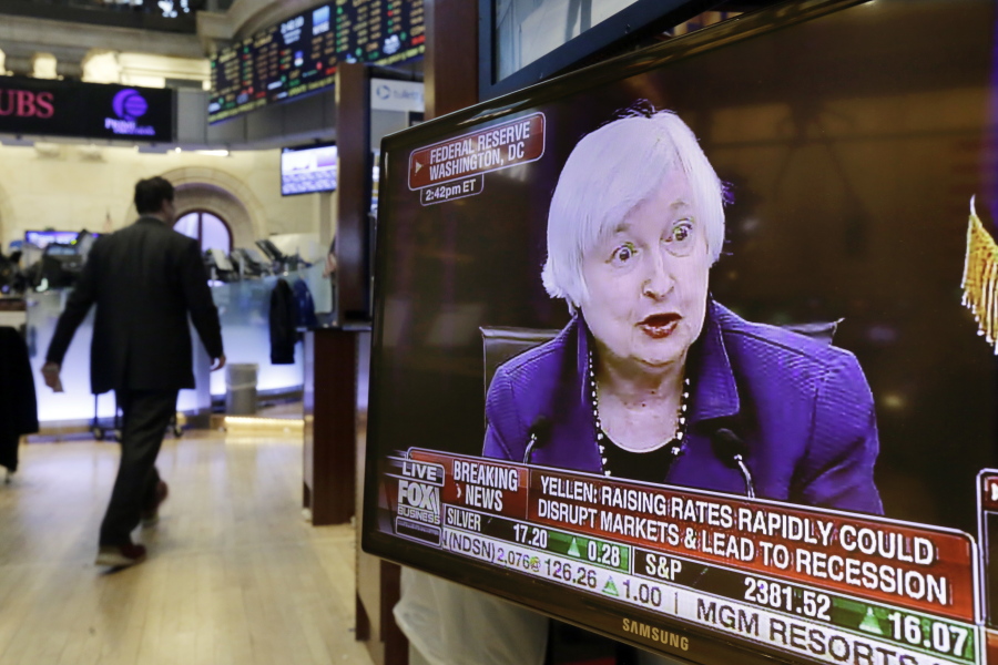 Federal Reserve Chair Janet Yellen&#039;s news conference appears on a television screen on the floor of the New York Stock Exchange on Wednesday.