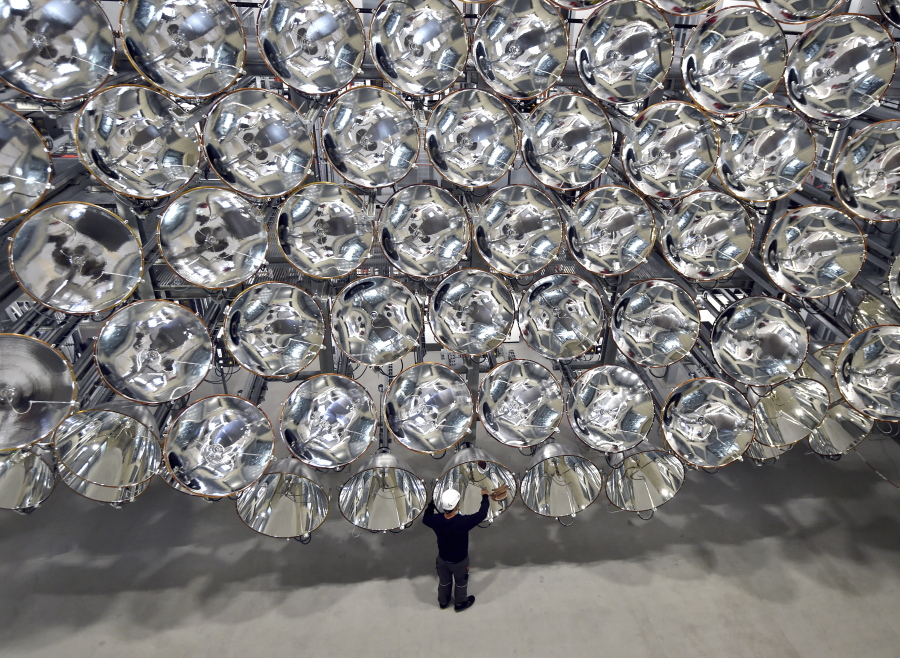 Engineer Volkmar Dohmen stands in front of xenon short-arc lamps in the DLR German national aeronautics and space research center in Juelich, western Germany. The lights are part of an artificial sun that will be used for research purposes.