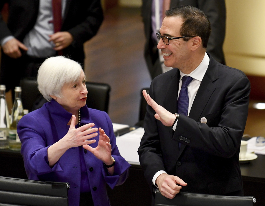 Janet Yellen, president of the Federal Reserve Board, and U.S. Treasury Secretary Steven Mnuchin talk during the G-20 finance ministers meeting in Baden-Baden, Germany, Friday.