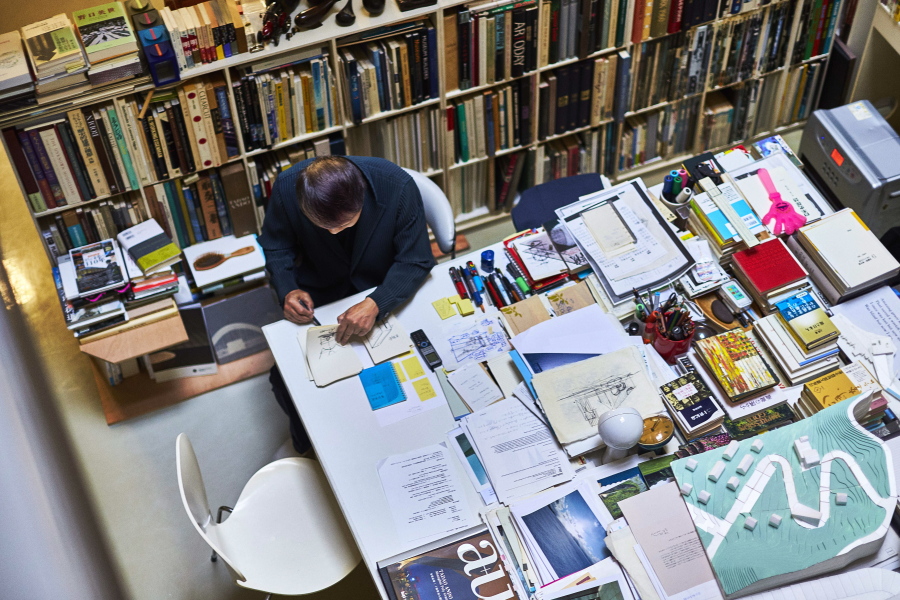 Tadao Ando in Osaka, Japan, works at his desk. The photo is featured in the book &quot;Where They Create,&quot; which explores people and their creative studios.