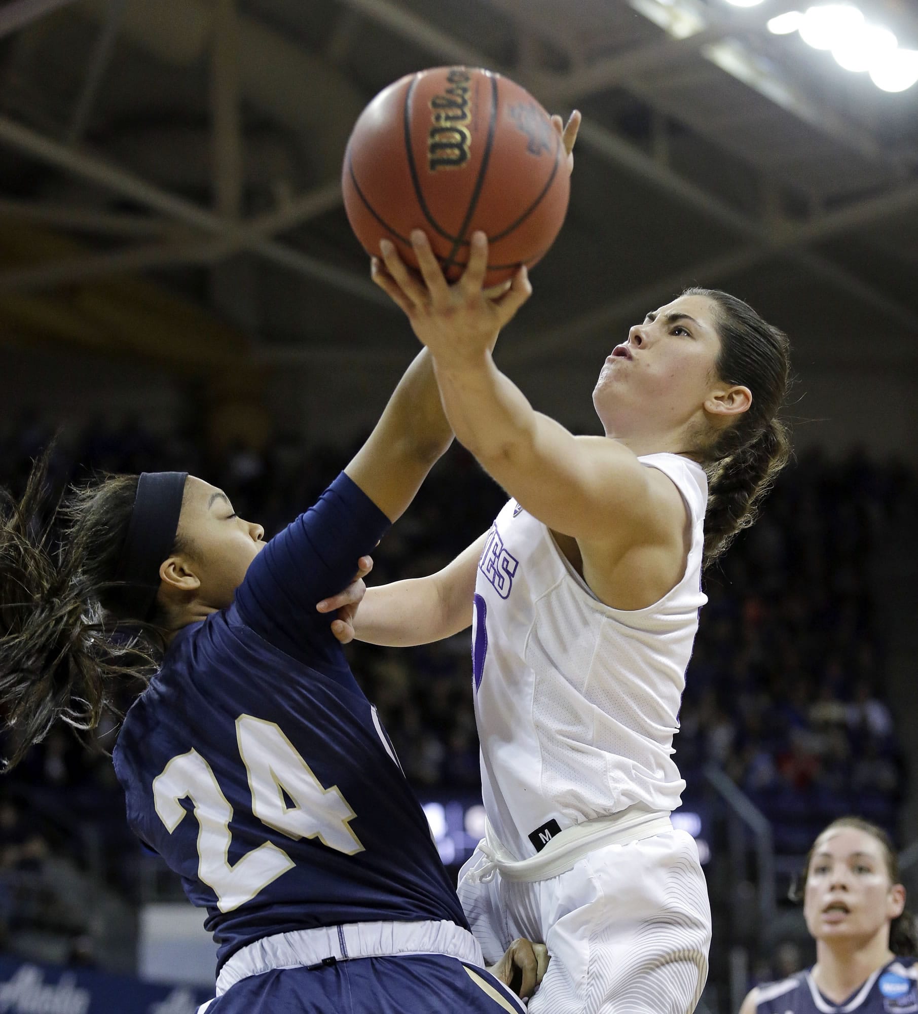 Washington's Kelsey Plum, right, drives as Montana State's Oliana Squires defends during the second half of a first-round game in the NCAA women's college basketball tournament Saturday, March 18, 2017, in Seattle. Washington won 91-63.