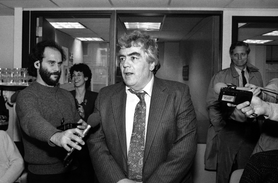 Jimmy Breslin of the New York Daily News, speaks April 17, 1986 to reporters after winning the Pulitzer prize for commentary, in the newsroom of the newspaper in New York. Breslin, the chronicler of wise guys and underdogs who became the brash embodiment of the old-time, street smart New Yorker, died Sunday. His stepdaughter said Breslin died at his Manhattan home of complications from pneumonia.
