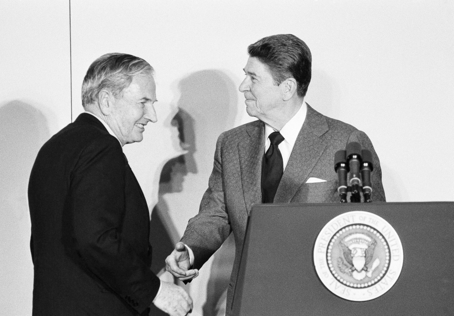 David Rockefeller, left, chairman of the Council Americas, shakes hands with President Ronald Reagan at the State Department in Washington. David Rockefeller, the billionaire philanthropist who was the last of his generation in the famously philanthropic Rockefeller family died Monday, according to a family spokesman.