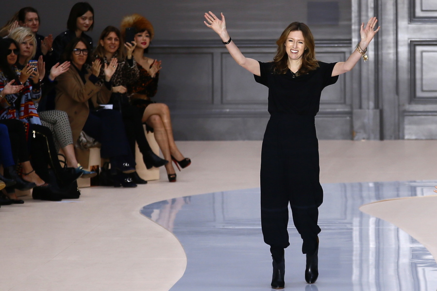 British-born fashion designer Clare Waight Keller acknowledges applause March 2 at the end of the presentation of Chloe&#039;s Fall-Winter 2017-2018 ready to wear fashion collection in Paris.