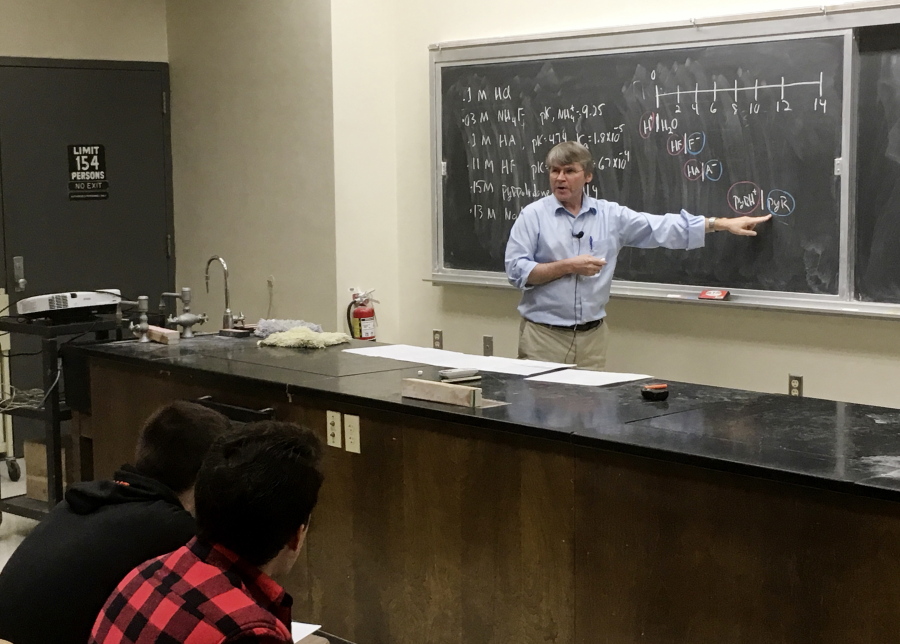 University of Wisconsin-Madison chemistry professor Robert Hamers lectures during a class in Madison, Wis.  Wisconsin Gov. Scott Walker has joined a national conservative push to get professors to do more teaching and less research.