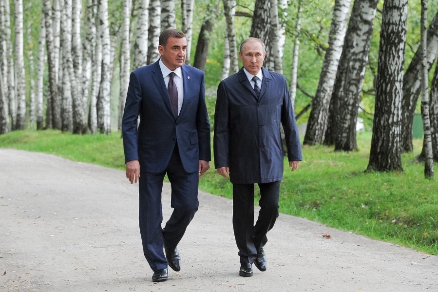 Russian President Vladimir Putin, right, walks with Acting Governor of the Tula Region Alexei Dyumin while visiting the Museum-estate of Leo Tolstoy &quot;Yasnaya Polyana&quot; in Yasnaya Polyana near Tula, about 200 kilometers  south of Moscow, Russia. With a year to go before Russia&#039;s presidential election, President Vladimir Putin is set to glide easily to another term against a familiar pack of torpid rivals - leftovers from past races.