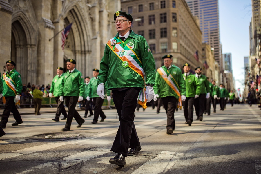A group marches up Fifth Avenue during the St. Patrick&#039;s Day Parade on Friday in New York.