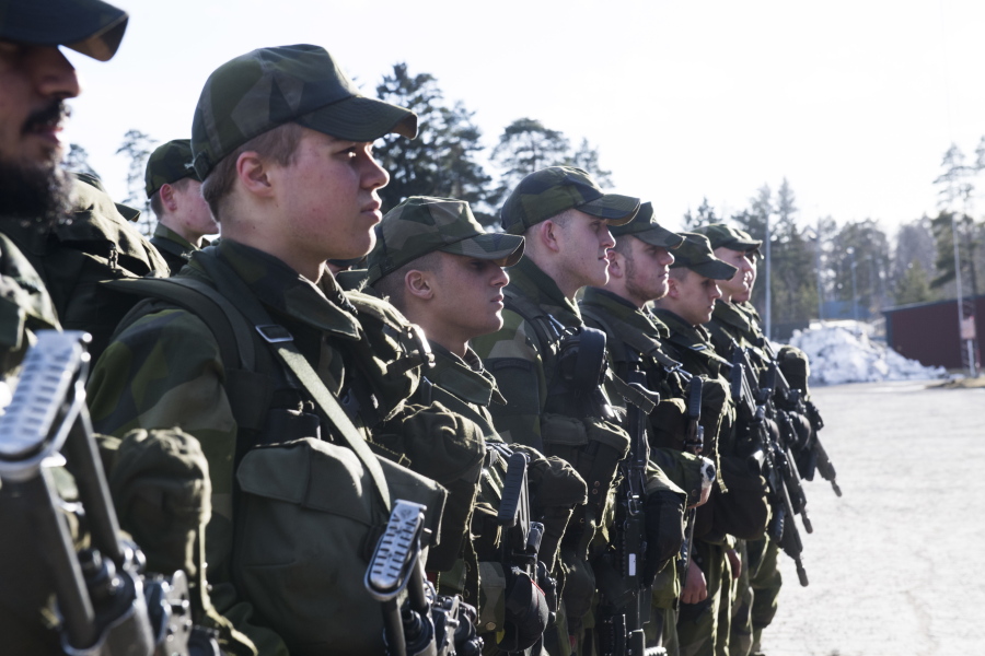 Young recruits during an inspection, Thursday, March 2, 2017 at the regiment in Enkoping 70 km north-west of Stockholm, Sweden. Sweden&#039;s left-leaning government introduced a military draft for both men and women Thursday because of what its defense minister called a deteriorating security environment in Europe and around Sweden.