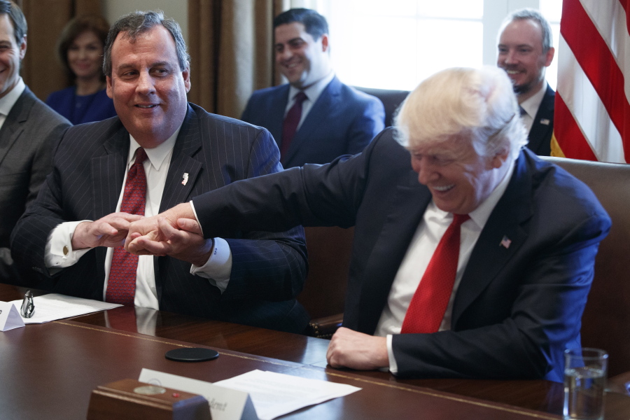 Gov. Chris Christie, R-N.J. shares a laugh with President Donald Trump during an opioid and drug abuse listening session, Wednesday, March 29, 2017, in the Roosevelt Room of the White House in Washington.