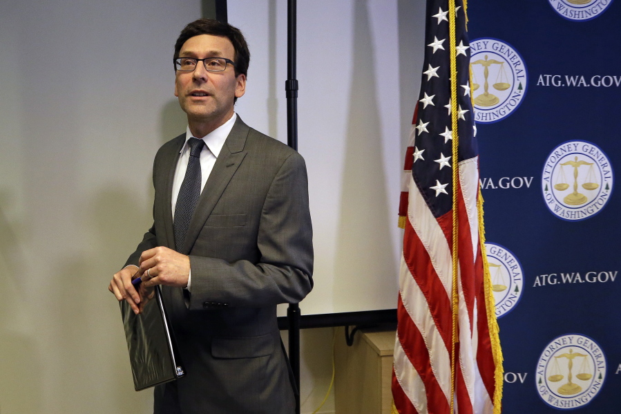 Washington State Attorney General Bob Ferguson finishes a news conference about the state&#039;s response to President Trump&#039;s revised travel ban March 9 in Seattle.