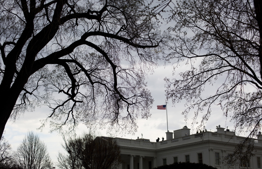 Storm clouds gather over the White House on Wednesday in Washington.