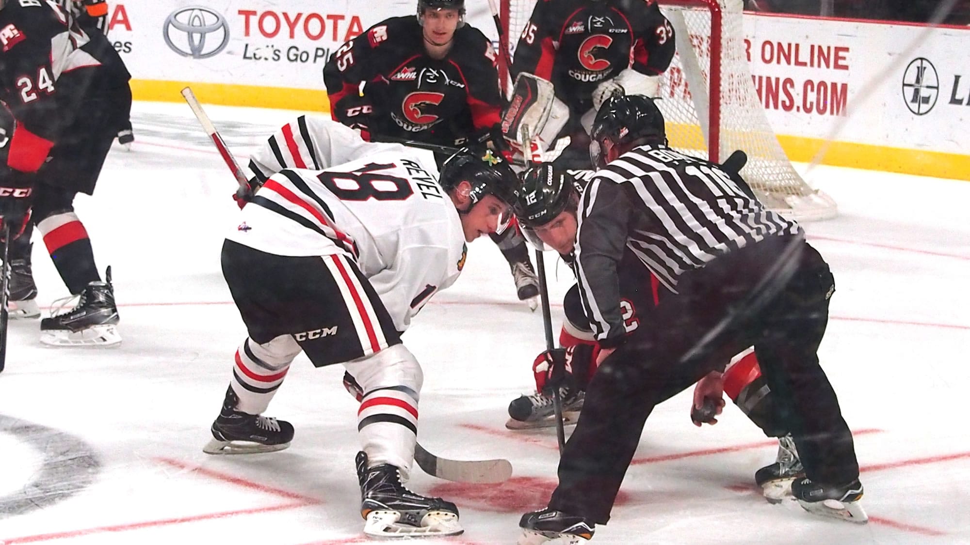 Portland Winterhawks center Matt Revel, left, scored the game-tying and winning goals in the third period as the Winterhawks beat Prince George 5-4 on Thursday in Game 4 of the first round of the Western Hockey League playoffs.