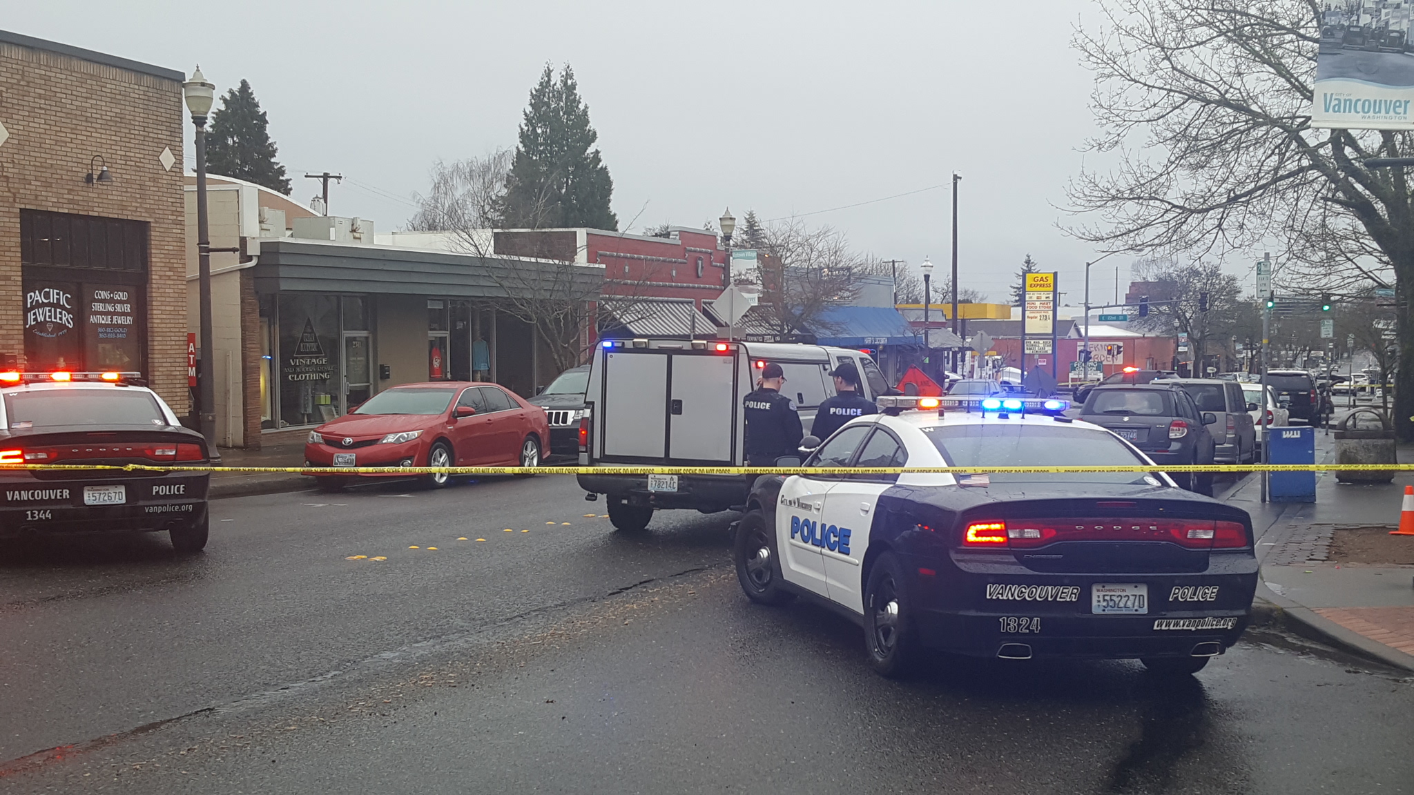 Vancouver police cordon off a section of Main Street in Uptown Village on Saturday while investigating a suspected explosive device found on a sidewalk in the 2300 block of Main Street. The items were later removed by bomb squad personnel.