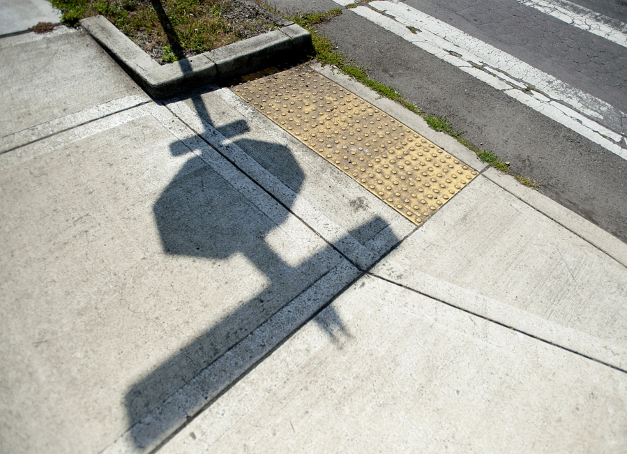 The city of Vancouver is having more than 160 existing curbs modified to be compliant with the Americans with Disabilities Act, similar to this curb cut at an intersection along Southeast Park Crest Avenue.
