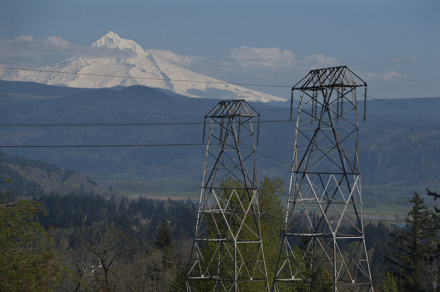 High voltage power lines are seen in 2016, looking east from Oak Creek Park as Mount Hood is visible in the background.