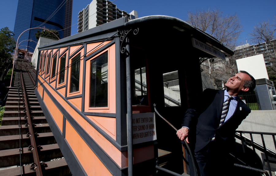 Los Angeles Mayor Eric Garcetti poses for pictures March 1 after joining city officials, contractors and dignitaries for a press conference, announcing the refurbishment and reopening of the historic Angels Flight railway in downtown L.A.