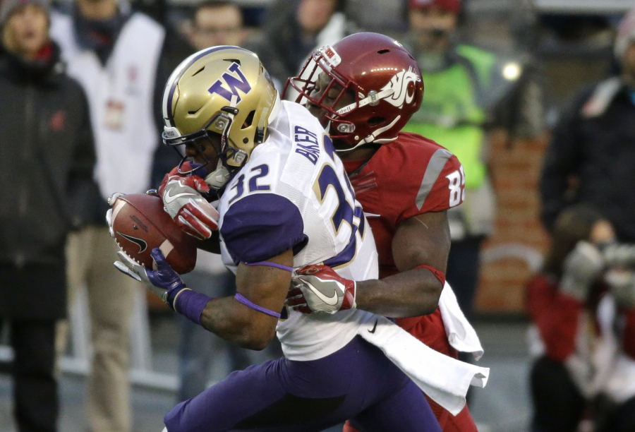 Washington&#039;s Budda Baker (32) is one of the top defensive back prospects in the NFL Draft. He could be available when Seattle picks No. 26. (Ted S.