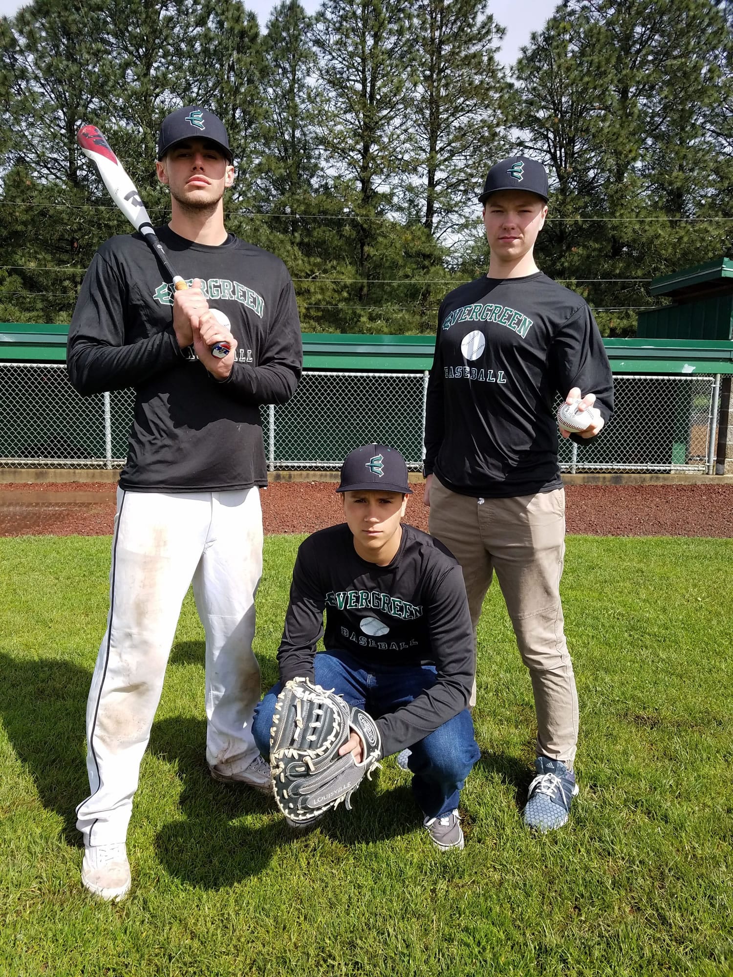 Trevor Swartz, left, catcher Nate Tomas, and Tommy Snyder are part of a pitching-and-defense focus that has Evergreen atop the 3A Greater St. Helens League.