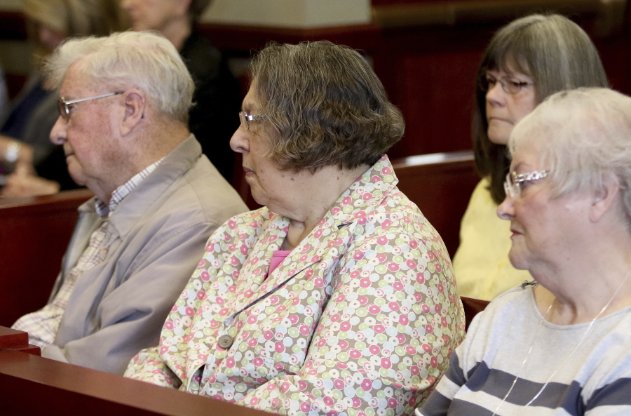 Bill Quinn, from left, wife Pat Quinn, and family friend Nancy Miller listen in court Wednesday. Pat Quinn is the sister of Maria Ridulph, who was killed in 1957 at age 7.