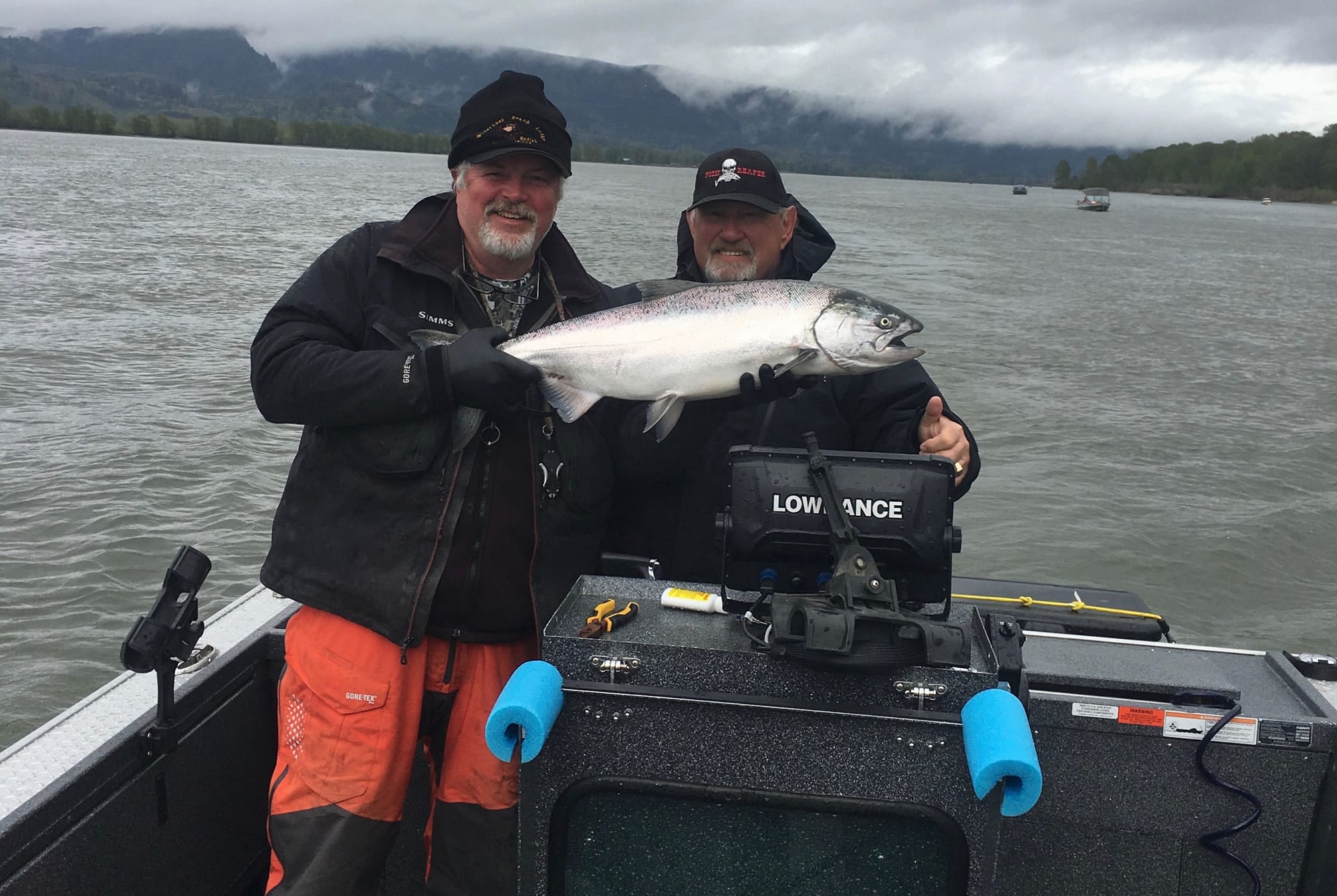 Guides Chris Sessions and Mike Kelly with a spring chinook caught Sunday in the Columbia River near Cathlamet.