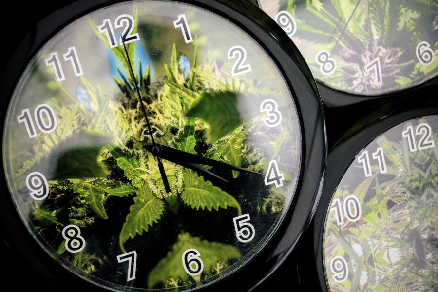 Set to the symbolic 4:20 time, weed patterns adorn clocks up for sale on the first of three days of Hempfest, Seattle&#039;s annual gathering to advocate the decriminalization of marijuana at Myrtle Edwards Park on the waterfront in Seattle.