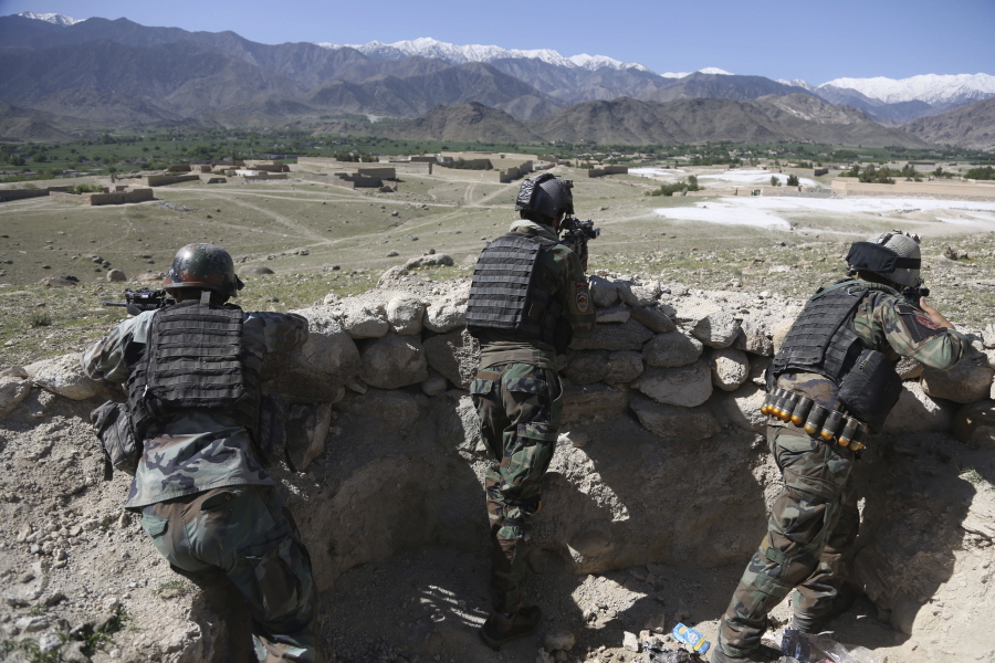 Afghan commandos are positioned Friday in Pandola village near the site of Thursday&#039;s U.S. bombing of an Islamic State tunnel complex in the Achin district, east of Kabul, Afghanistan.