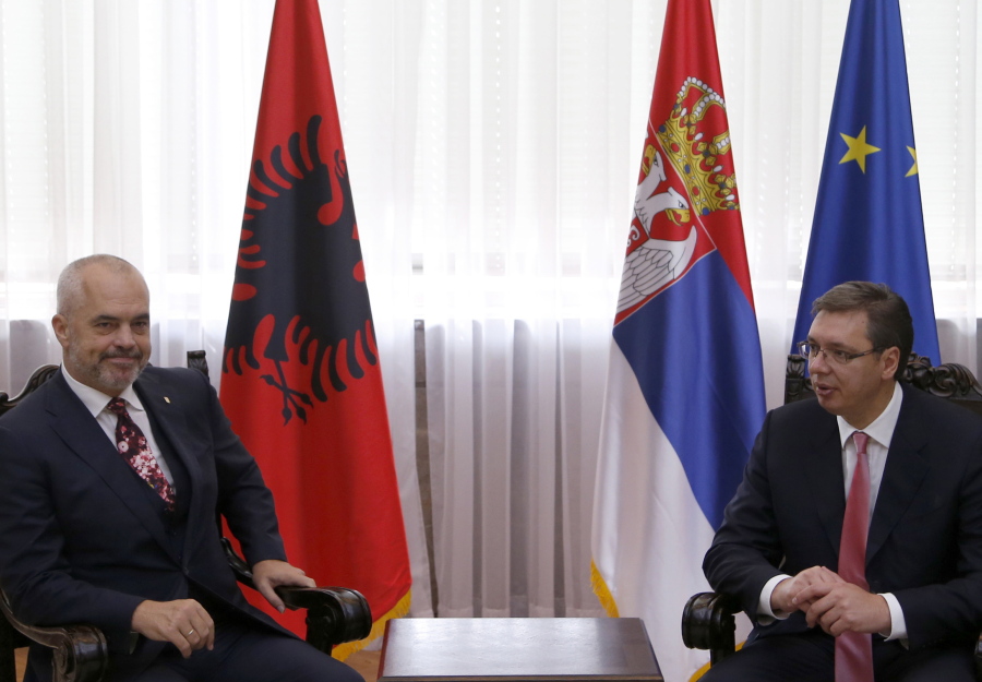 Serbian Prime Minister Aleksandar Vucic, right, speaks with his Albanian counterpart Edi Rama on Oct. 13, 2016, in Belgrade, Serbia. Serbian officials warned on Friday, April 21, 2017 of another war in the Balkans if Albanians try to form a joint state with Kosovo in the war-weary European region and the West does not reject such a plan.