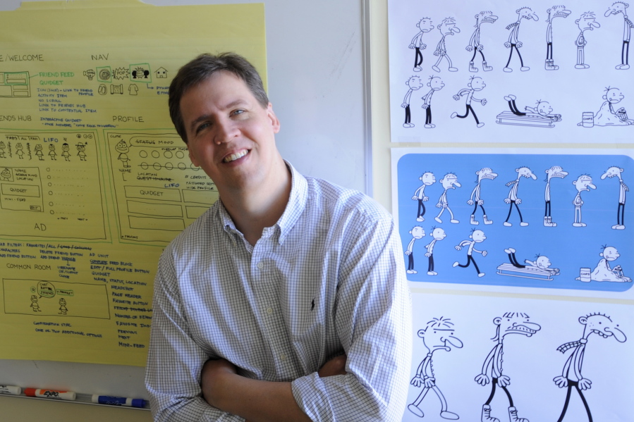 Jeff Kinney, author of the &quot;Diary of a Wimpy Kid&quot; children&#039;s book series, poses for a portrait at his Boston office in 2011. The first 11 novels have sold more than 180 million copies and the series has been the basis for four movies.