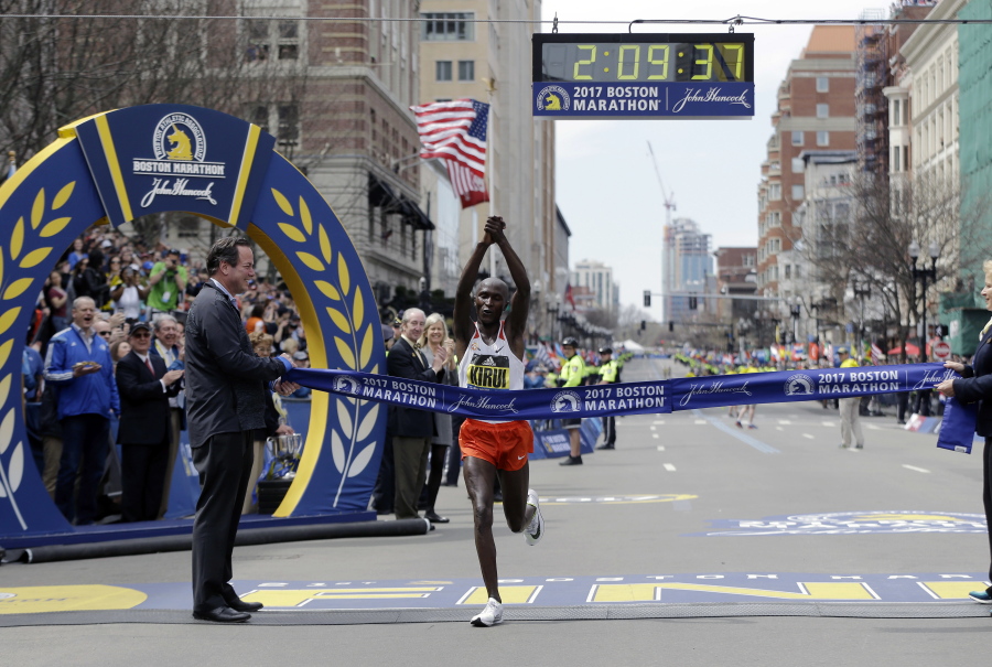 Geoffrey Kirui, of Kenya, crosses the finish line to win the 121st Boston Marathon on Monday in Boston.