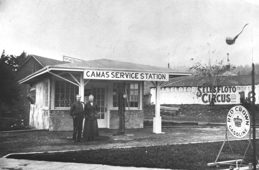 1923 - Service Station at N.W. Corner of 3rd and Dallas, Camas. Mr. and Mrs. Peter Gay are pictured.