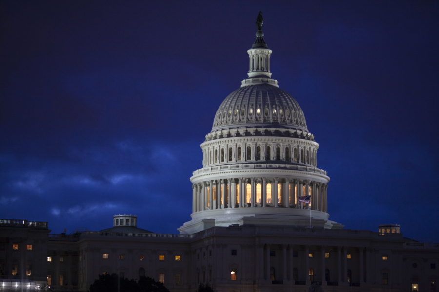 The Capitol is seen at dawn April 4 in Washington. Bipartisan bargainers are making progress toward a budget deal to prevent a partial federal shutdown this weekend, a major hurdle overcome when President Donald Trump signaled he would put off his demand that the measure include money to build his border wall with Mexico. (AP Photo/J.