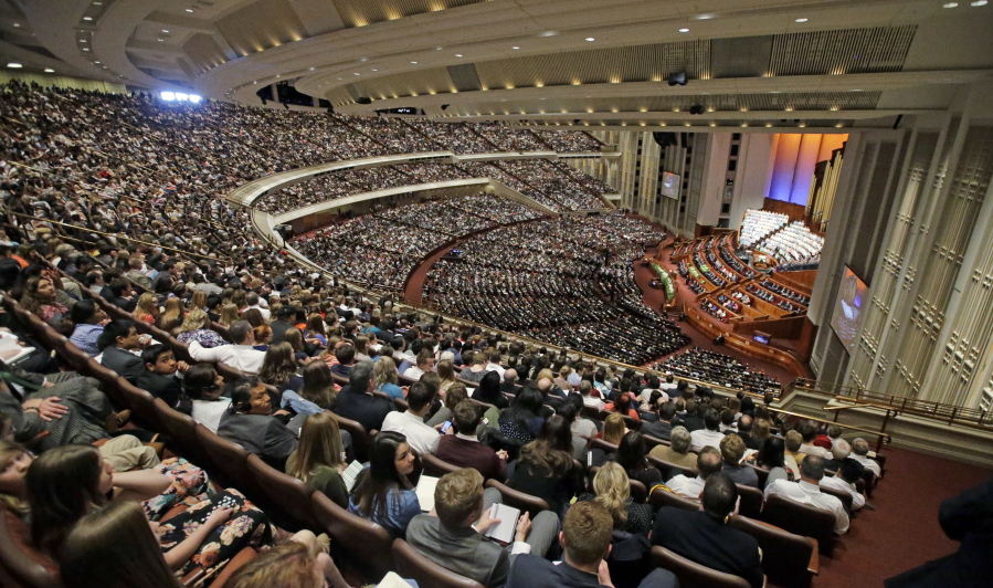 People attend the afternoon session of the two-day Mormon church conference Saturday in Salt Lake City.