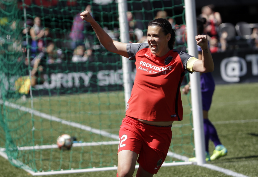 Portland Thorns forward Christine Sinclair celebrates scoring a goal during the second half of their NWSL soccer match against the Orlando Pride in Portland, Ore., Saturday, April 15, 2017. Portland won 2-0.