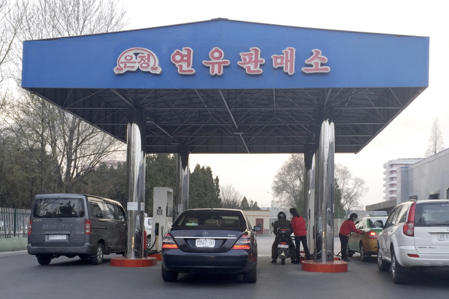 Cars line up at a gas station in Pyongyang, North Korea, on April 1, 2016. Car users in Pyongyang are scrambling to fill up their tanks as gas stations limit services and close their gates amid concerns of a possible shortage. The cause of the restrictions or how long they might last were not immediately known.