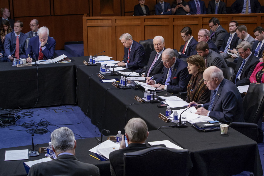 The Senate Judiciary Committee meets to advance the nomination of President Donald Trump&#039;s Supreme Court nominee Neil Gorsuch to fill the vacancy left by the late Antonin Scalia on Monday on Capitol Hill in Washington. Top, from left are, Sen. John Cornyn, R-Texas, Sen. Lindsey Graham, R-S.C., Sen. Orrin Hatch, R-Utah, Committee Chairman Sen. Charles Grassley, R-Iowa, the Committee&#039;s ranking member Sen. Dianne Feinstein, D-Calif. and Sen. Patrick Leahy, D-Vt. (AP Photo/J.